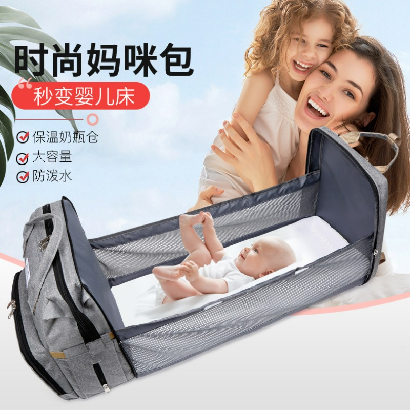 Fashionable Folding Baby Crib  - Backpack Diaper Bag recensie en prijs